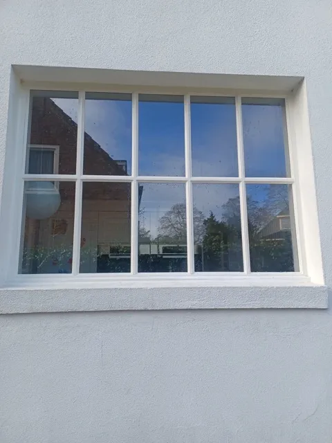 Vacuümglas - voorbeeld van installatie in raam met kleine ruitjes